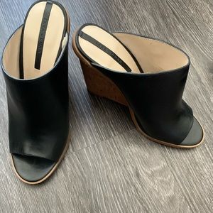 ZARA Woman black leather mules with wedge heel